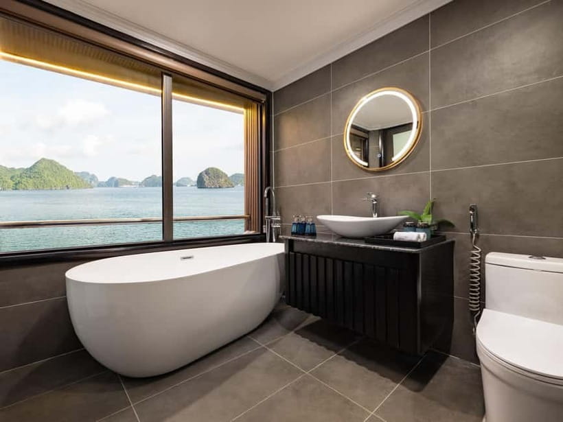 2-Day or 3-Day: Halong&Lan Ha Bay Cruise 5<em> balcony,bathtub – Key points to know’ /></p>
<ul>
<li><strong>The 3-day plan includes Viet Hai Village</strong>, with a bicycle ride or electric-car visit to a local family home.</li>
<li><strong>Doria Cruise has modern cabins with balconies and bathtubs</strong>, plus daily bottled water and a small outdoor pool.</li>
<li><strong>Tra Bau offers kayaking, swimming, or Jacuzzi time</strong>, with scenery linked to <em>Kong: Skull Island</em>.</li>
<li><strong>Dark and Bright Cave is visited by kayak or local bamboo boat</strong>, depending on your choice.</li>
<li><strong>The cruise earns its strongest praise for friendly staff and clean cabins</strong>, with guides such as William and Ashley noted for attentive service.</li>
<li><strong>The weak spots are food consistency, rushed activities, and transport hiccups</strong>, especially around Hanoi pickup and drop-off.</li>
</ul>
<h2 id="what-the-doria-cruise-experience-is-really-like">What the Doria Cruise experience is really like</h2>
<p><img width="820" height="615" decoding="async" src=