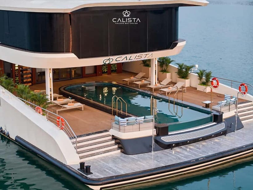 2D1N Halong Bay 6-Star Cruise: Fine Dining, Cave & Kayaking - Boarding at Tuan Chau and settling into your suite