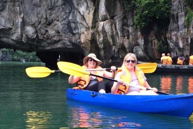 6 Hour Cruise in Hanoi - Boarding the boat and passing limestone islets