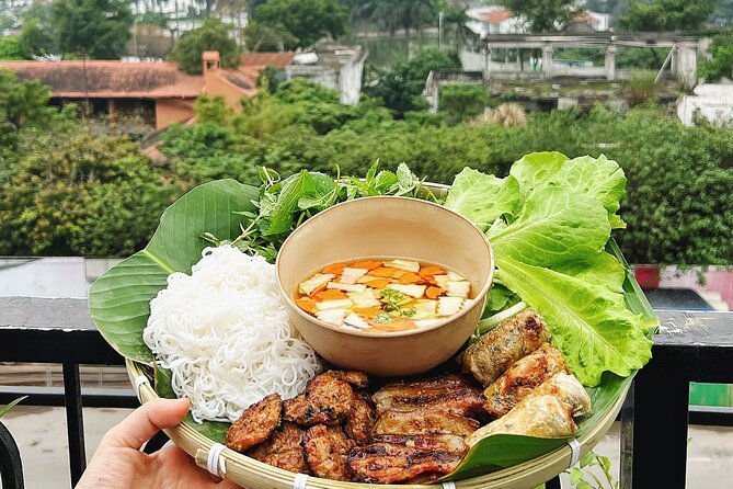 Authentic Bun Cha Hanoi making - with skyline view of Westlake - Cooking above West Lake