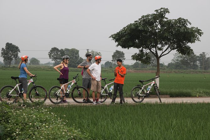 Bicycle Tour Full Day Explore Red River Delta & Rural Villages - The guides make or break the day