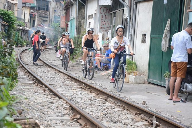Bicycle Tours Hanoi: Half Day Hanoi City Bicycle Tours - Crossing Long Bien Bridge