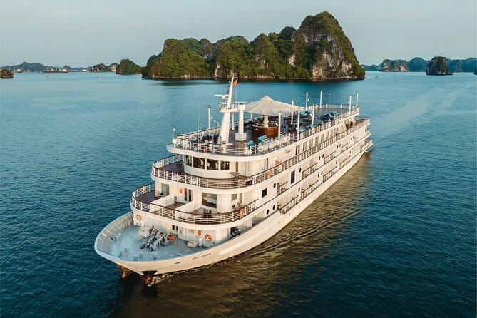Emeraude Cruise 2 days 1 night Ha Long Bay Tour - Sunrise coffee, cakes, and yoga from 6:00
