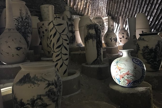 Explore Bat trang village & Ceramics factories with local guide - Walking through Bat Trang village