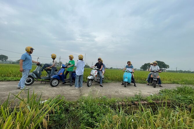 Exploring Vespa Tour Through Little Red River Delta - A Short Stop at Hanoi Opera House
