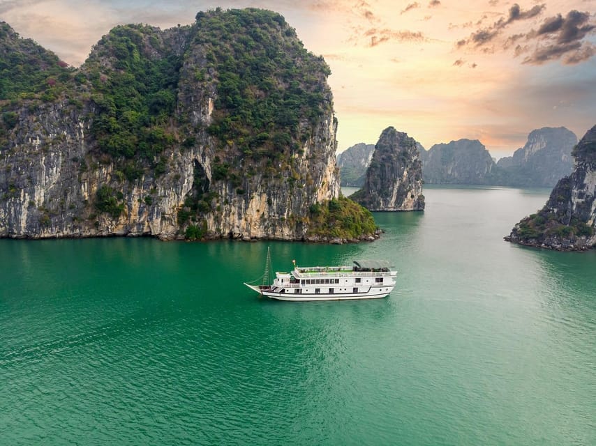 From Hanoi: 2-Day Ha Long Bay Boat Tour - Boarding, lunch, and the first view of Ha Long Bay