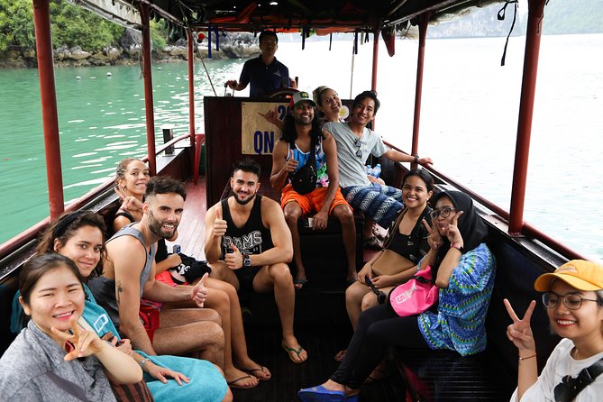 From Hanoi: 2D1N Ha Long Bay Deluxe Cruise with Bus Limousine - Sunset, dinner, and an evening on the boat