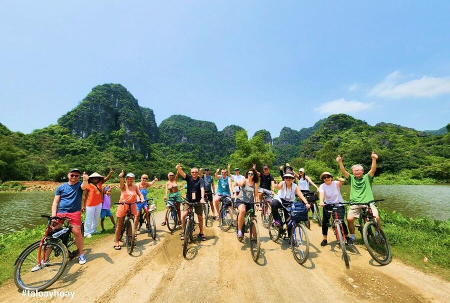 From Hanoi: Hoa Lu-Trang An-Mua Cave Luxury Trip w/Limousine - A short bicycle ride through the local village