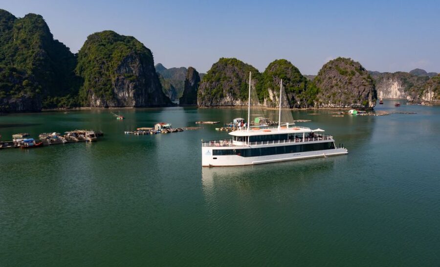 From Hanoi or Halong: Halong Bay Day Cruise - Passing the floating homes of local fishers