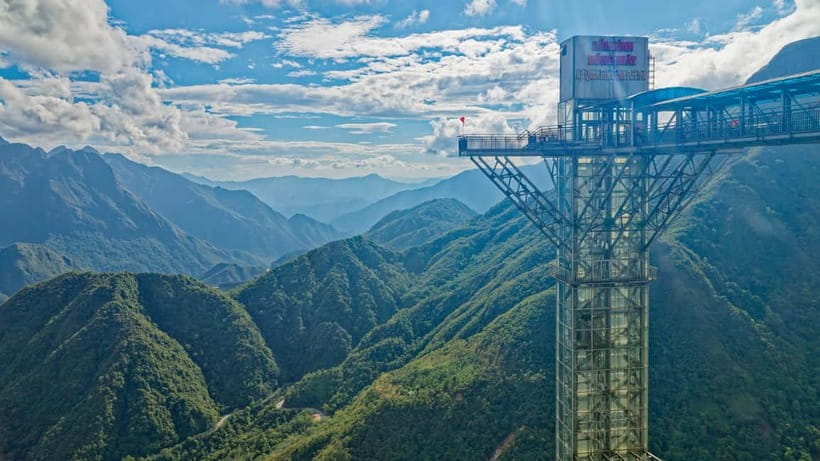 From Sapa: Glass Bridge and Silver Waterfall Group Tour - Riding the glass elevator to 2,200 meters