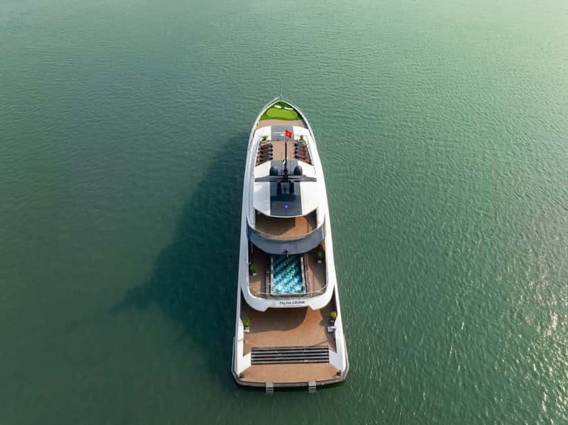 Full Day: Fabulous Halong Bay Tour with Taliya Cruise 5<em> – Key points at a glance’ /></p>
<ul>
<li><strong>Seven hours on the water:</strong> Cruise from Tuan Chau Marina through Halong Bay and Lan Ha Bay before returning to Hanoi the same evening.</li>
<li><strong>Dark and Bright Cave by bamboo boat:</strong> A local rower takes you through a quiet cave passage and into a sheltered lagoon.</li>
<li><strong>Swimming is part of the plan:</strong> At Ao Ech, you can kayak or get into the bay, an option many cruises do not always provide.</li>
<li><strong>A full meal with a view:</strong> Lunch is served in an air-conditioned restaurant while limestone islands pass outside the large windows.</li>
<li><strong>Sunset on the sundeck:</strong> Finish with afternoon tea, a spring-roll cooking demonstration, music-free social time, and sunset scenery.</li>
<li><strong>Guides make a difference:</strong> Frank, Chung Hoeng Van, and Vin are specifically praised for being friendly, flexible, and attentive.</li>
</ul>
<h2 id="what-the-57-price-really-covers">What the $57 price really covers</h2>
<p><img width="820" height="614" decoding="async" src=