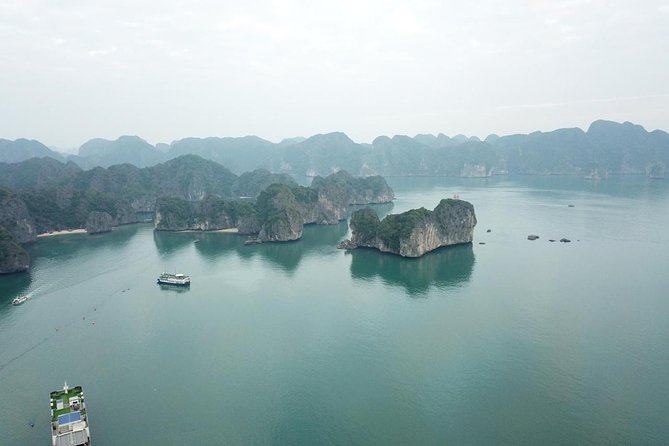 Ha Long Bay Six Hours Trip Kayaking & Swimming on Beach - Surprising Cave offers the day’s main walk