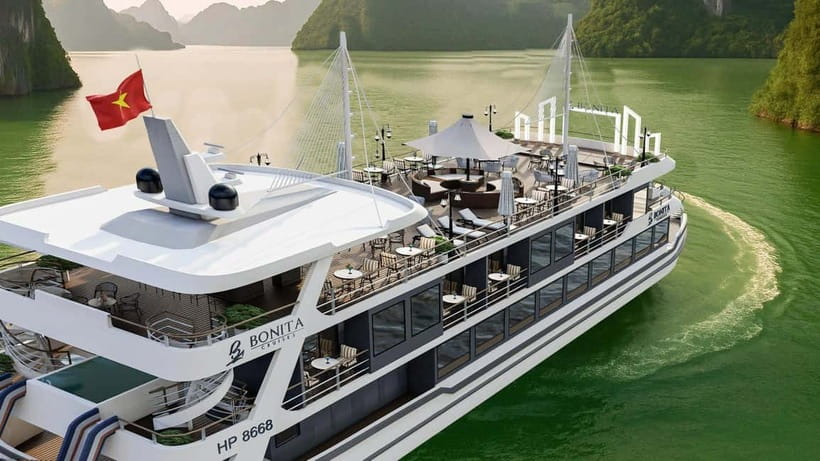 Ha Noi: Lan Ha Bay luxury cruise with private bancony, meals - A small boat through Lan Ha Bay
