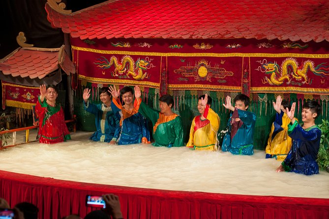 Ha Noi Night Tour And Water Puppet Show - Inside the theater: wooden figures, water, and Vietnamese music