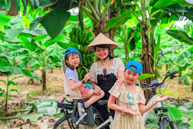 Half Day Ha Noi Tour by E-bike - Thanh Ha Market and everyday Hanoi