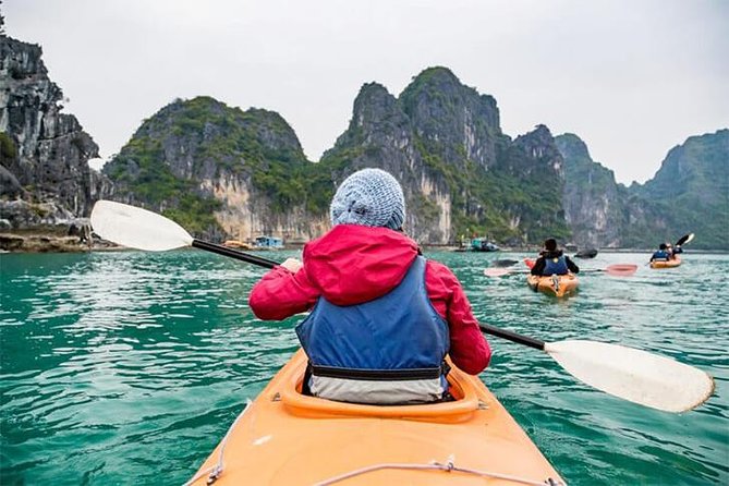 Halong Bay Cruise With Cave, Kayaking, Swimming - Buffet Lunch - Swimming and climbing at Titov Island