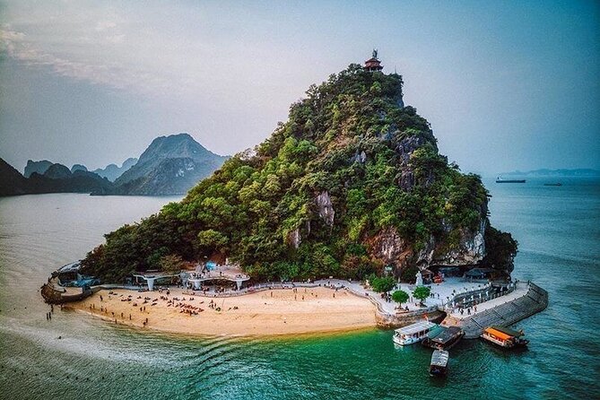 HaLong Bay Day Cruise with Kayaking, Swimming, Hiking and Lunch - Titop Island for swimming and the summit view