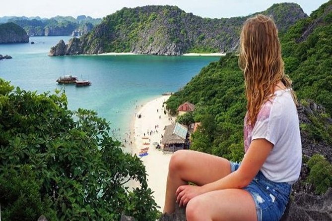 Halong Bay Day Tour: Visit Cave Island Kayaking Swimming Lunch - Titop Island packs in swimming and a steep view