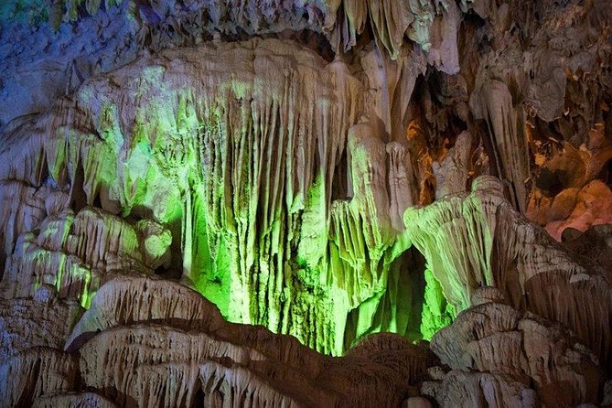 Halong Bay Full Day Tour with All-Inclusive: Boat, Kayak, Island, Cave and Lunch - The cave visit and its illuminated formations