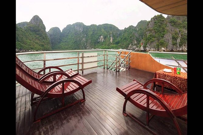 Halong Bay Full Day Tour with All-Inclusive: Boat, Kayak, Island, Cave and Lunch - Guide service, group size, and the human side of the day