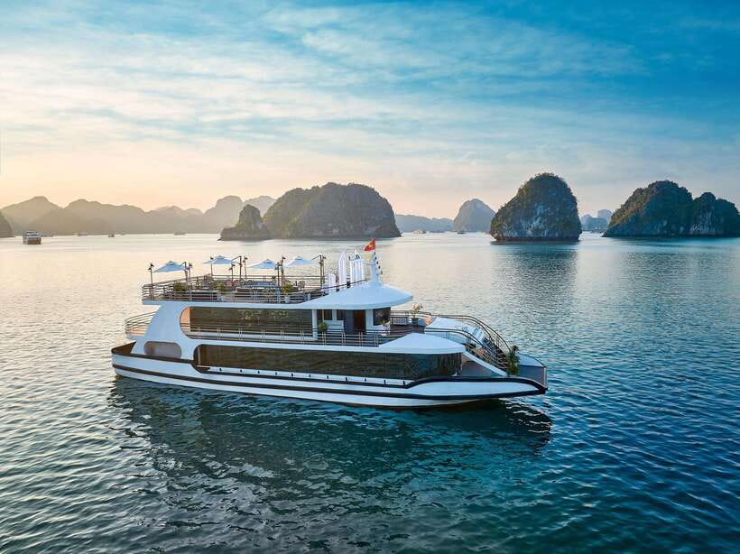 Halong Bay: Luxury Day Cruise with Buffet, Kayak, Swim - Boarding at Tuan Chau and settling into the cruise