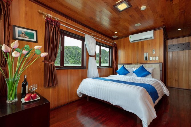 Halong deluxe cruise 2D/1N: Surprise cave, Titop island, Full Meals, best prices - Sunset, cooking class, and a night at anchor