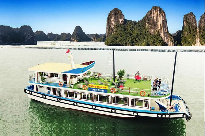 Halong Excursion Cruise with Kayaking, Swimming & Cave Visit - Tuan Chau Harbor and the first view of the bay