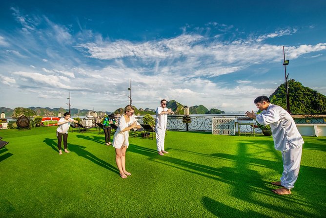 Halong Luxury Cruise 2D/1N: Kayaking, swimming, Titop island, Surprise cave - Kayaking through a quiet lagoon