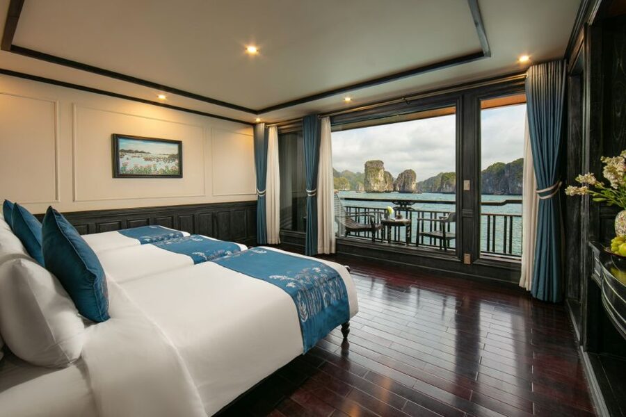 Hanoi: 2-Day Halong & Lan Ha Bay 5-Star Cruise with Balcony - Sunset, spring rolls, and squid fishing after dark