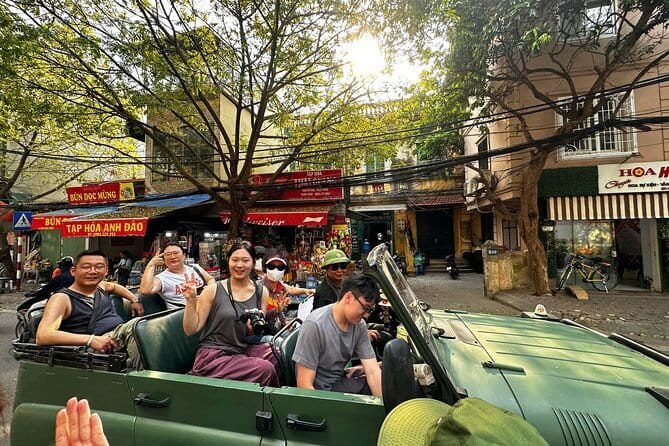 Hanoi Army Jeep Tour with Food and Culture Sightseeing - Riding through the Old Quarter and everyday streets