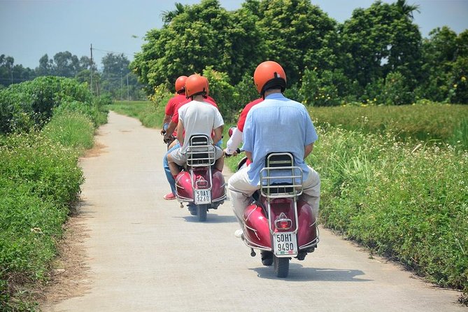 Hanoi Back Street Vespa Tours: Full Day Vespa Tours - Leaving central Hanoi for Long Bien Bridge
