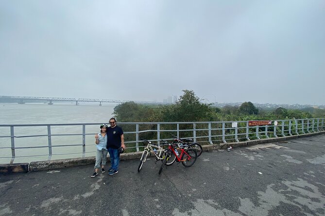 Hanoi City Bike Tour through Banana Island & Food Tasting - Crossing Long Bien Bridge