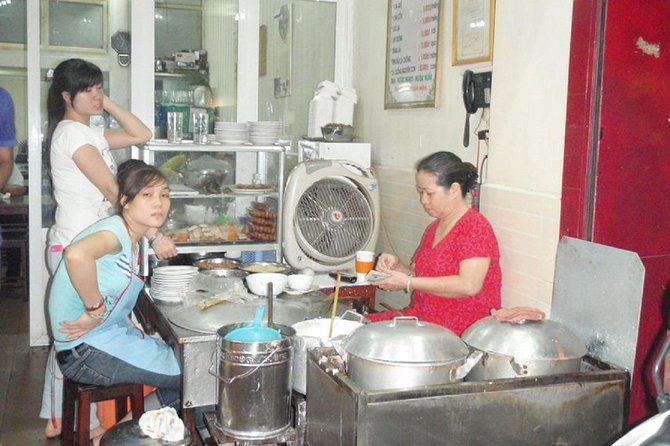 Hanoi City Street Food Night Tour by Motorscooter - Dong Xuan Market and the city’s food culture