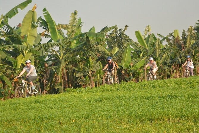 Hanoi Countryside By Bike & Local House and Food Tasting - Leaving Hanoi by way of Long Bien Bridge
