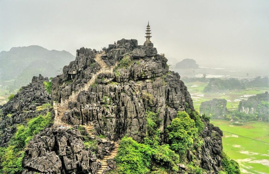Hanoi: Guided Full-Day Hoa Lu, Trang An and Mua Cave Tour - Cycling through the village