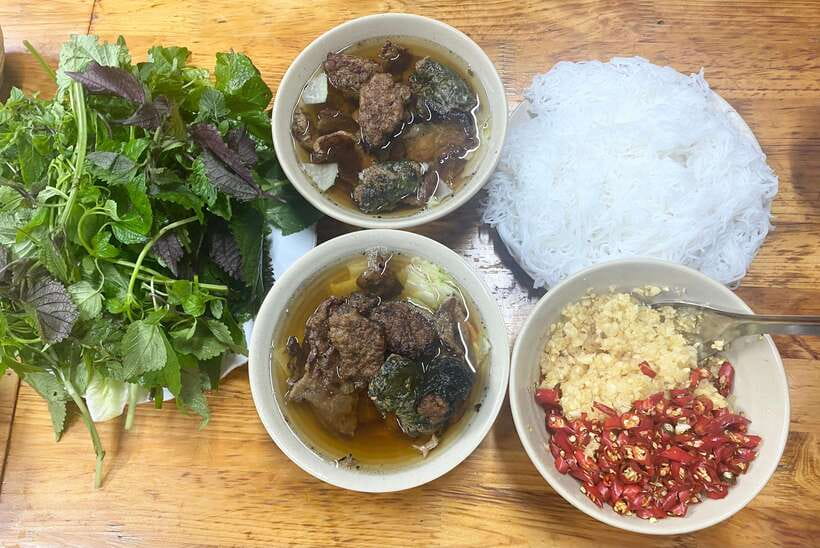 Hanoi: Guided Street Food Tour with Train Street Experience - Meeting near Cafe Dinh and setting off on foot
