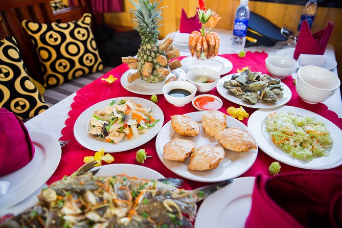 Hanoi: Halong Bay Luxury Option – Titop, Surprise Cave, Kayak - Walking through Surprise Cave