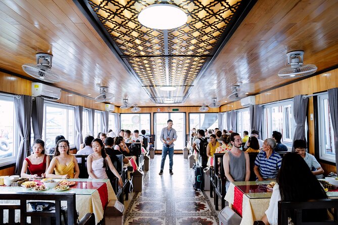 Hanoi: Halong Bay Luxury Option – Titop, Surprise Cave, Kayak - Kayaking or taking a bamboo boat through Luon Cave