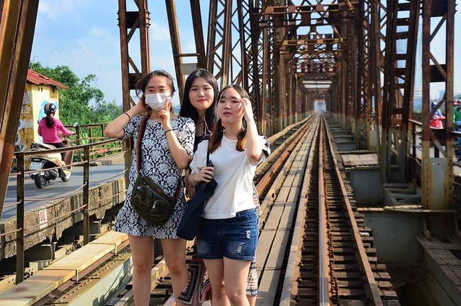 Hanoi Jeep Foodie Tours Led By Women - Long Bien Bridge under the night sky
