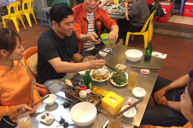 Hanoi Motorbike Tour Led By Women: Hanoi Motorbike Food Tours - West Lake and Hanoi after sunset