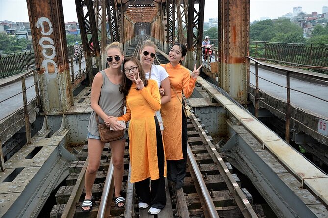 Hanoi Motorbike Tours: Hanoi Motorbike Food Tours Led By Women - Crossing Long Bien Bridge above the Red River