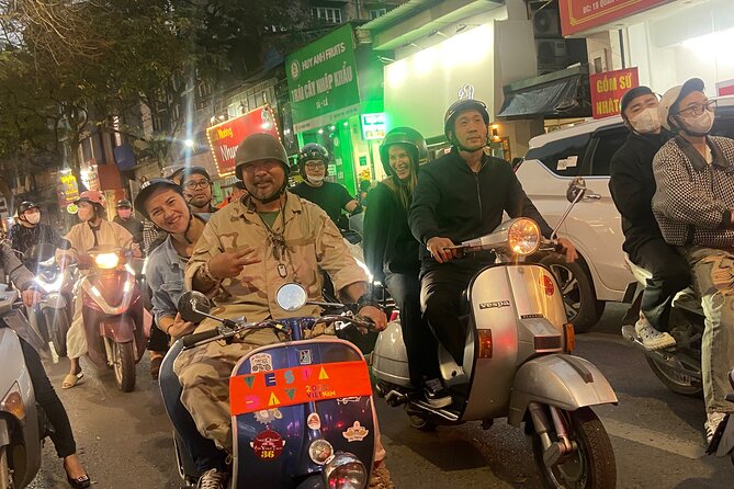 Hanoi Motorbike Tours with Female Riders - Train Street starts the tour with Hanoi at full volume