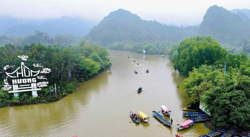 Hanoi: Perfume Pagoda Day Tour with Boat Ride & Cave Visit - Reaching Huong Tich Cave