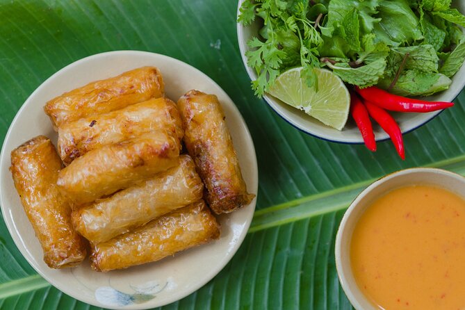 Hanoi Street Eats Evening Small Group Tour - The Old Quarter after dark