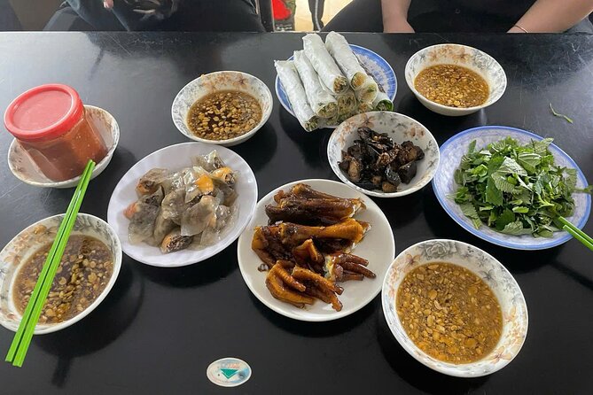 Hanoi Street Food Tour by Motorbike or Walking with Local Guide - Phung Hung Mural Street brings Hanoi’s past into view