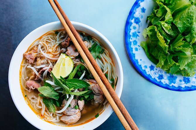 Hanoi Street Food Tour By Motorbike + Sightseeing SAFE & FUN - The first tastes: bun cha and grilled spring rolls