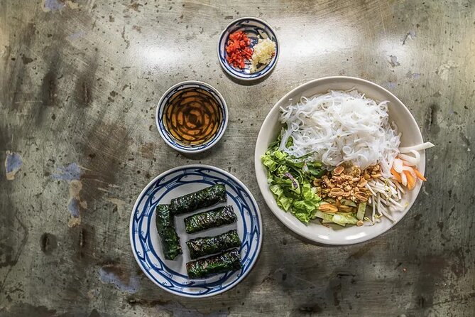 Hanoi Street Food Tour By Motorbike + Sightseeing SAFE & FUN - Steam rice pancakes in Hanoi’s Old Town