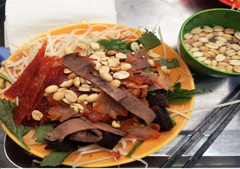 Hanoi: Street Food Tour with Train Street & Hidden Alleyways - Dry Pho: A Different Take on Vietnam’s Best-Known Noodle