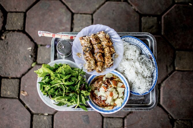 Hanoi Vegan Street Food Tour and Train Street - Stop one: steamed rice pancakes at 128 Trần Nhật Duật