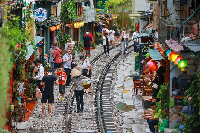 Hanoi Vespa After Dark Street food + Train Street+ Live Music - Train Street, a short walk, and egg coffee